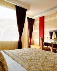 dormitorio vista Tami Residence Hotel Nis