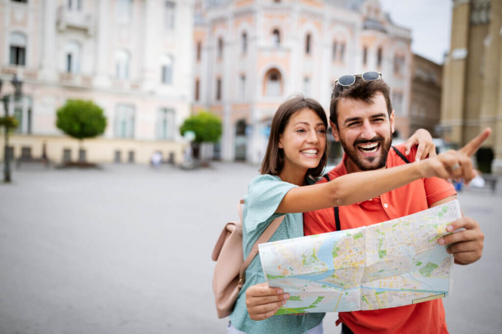 Happy couple on vacation sightseeing in Novi Sad city